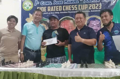 Panabo City chesser in dire need of money for sick son declared champion in Bukidnon